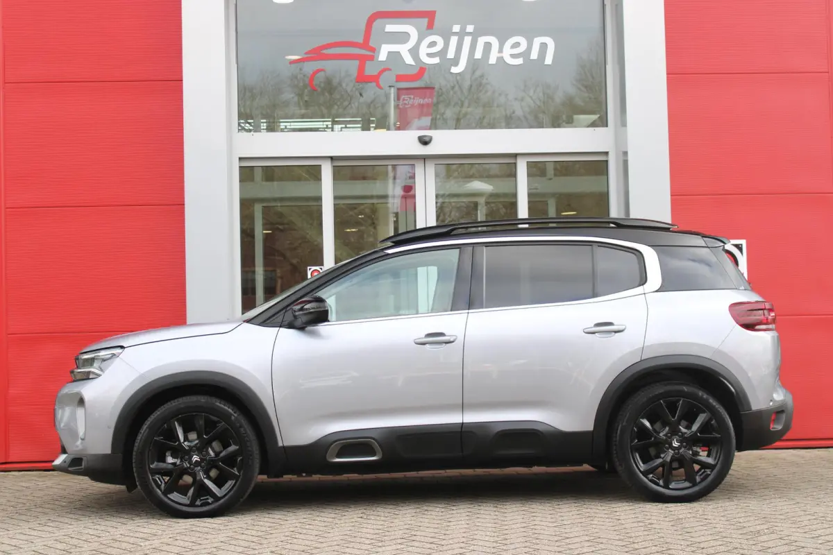 1.2 145PK AUTOMAAT Hybrid ë-SERIES | ELEKTRISCH BEDIENBARE BESTUURDERSSTOEL | APPLE CARPLAY/ANDROID AUTO | NAVIGATIE | FULL LED KOPLAMPEN | CLIMATE CONTROL | DAB+ RADIO | 19" LICHTMETALEN V