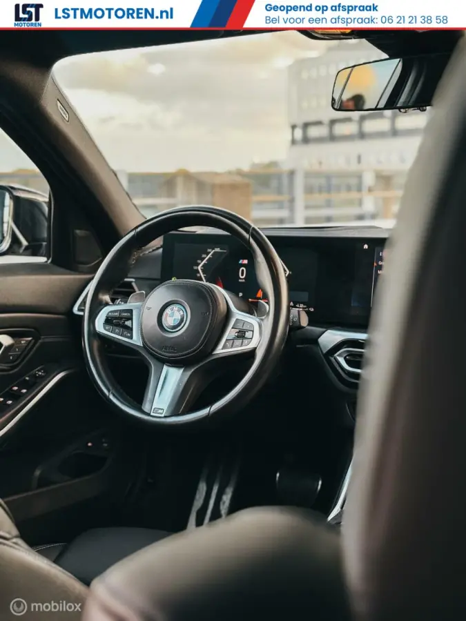 330e M Sport Panoramadak HUD Trekhaak Apple CarPlay Android Auto 19”