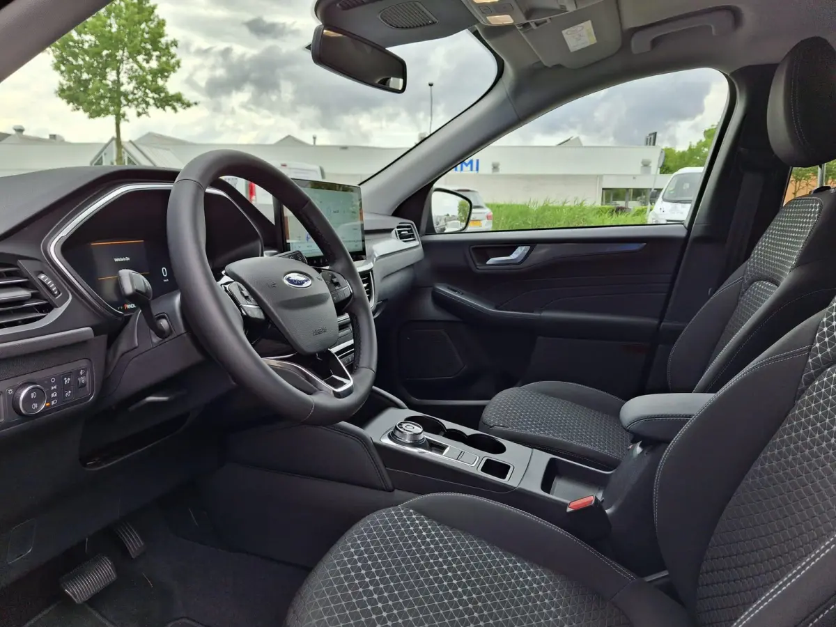 2.5 PHEV Titanium | €4000 Ford voordeel | Gratis laadpaal | Te Bestellen | 243PK  | Elektrisch wegklapbare trekhaak | Navigatie | Achteruitrijcamera | Parkeersensoren | DAB | Apple Carplay