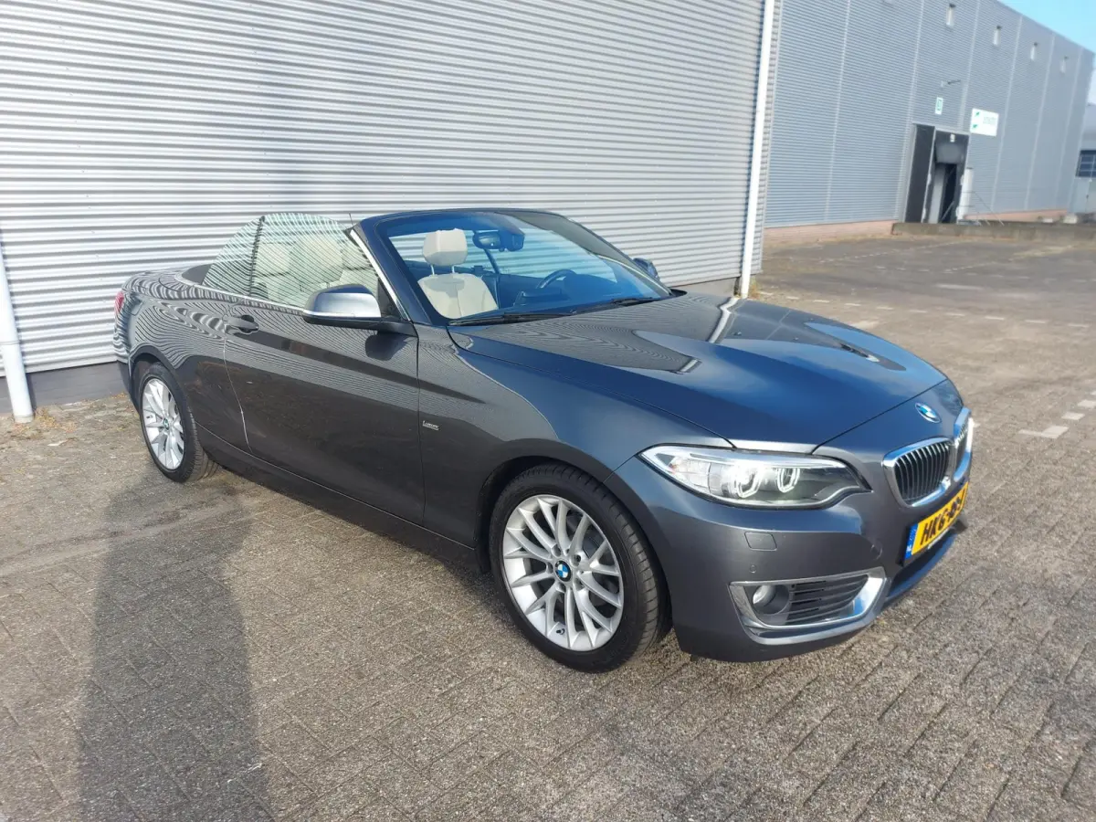 218i High Executive, airco,navigatie,stoelverwarming,parkeersensoren,cruisecontrol,