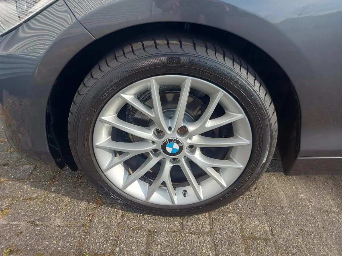 218i High Executive, airco,navigatie,stoelverwarming,parkeersensoren,cruisecontrol,