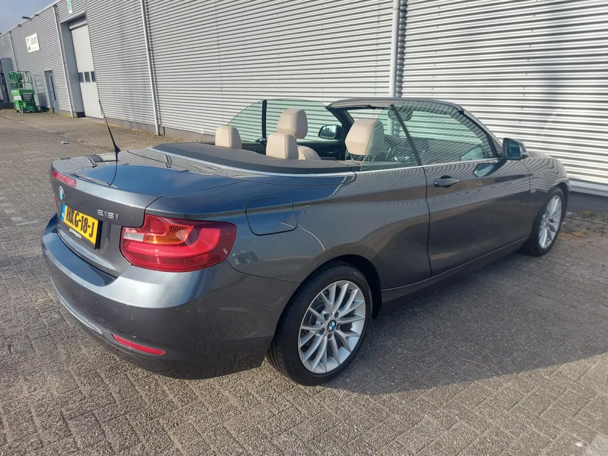218i High Executive, airco,navigatie,stoelverwarming,parkeersensoren,cruisecontrol,