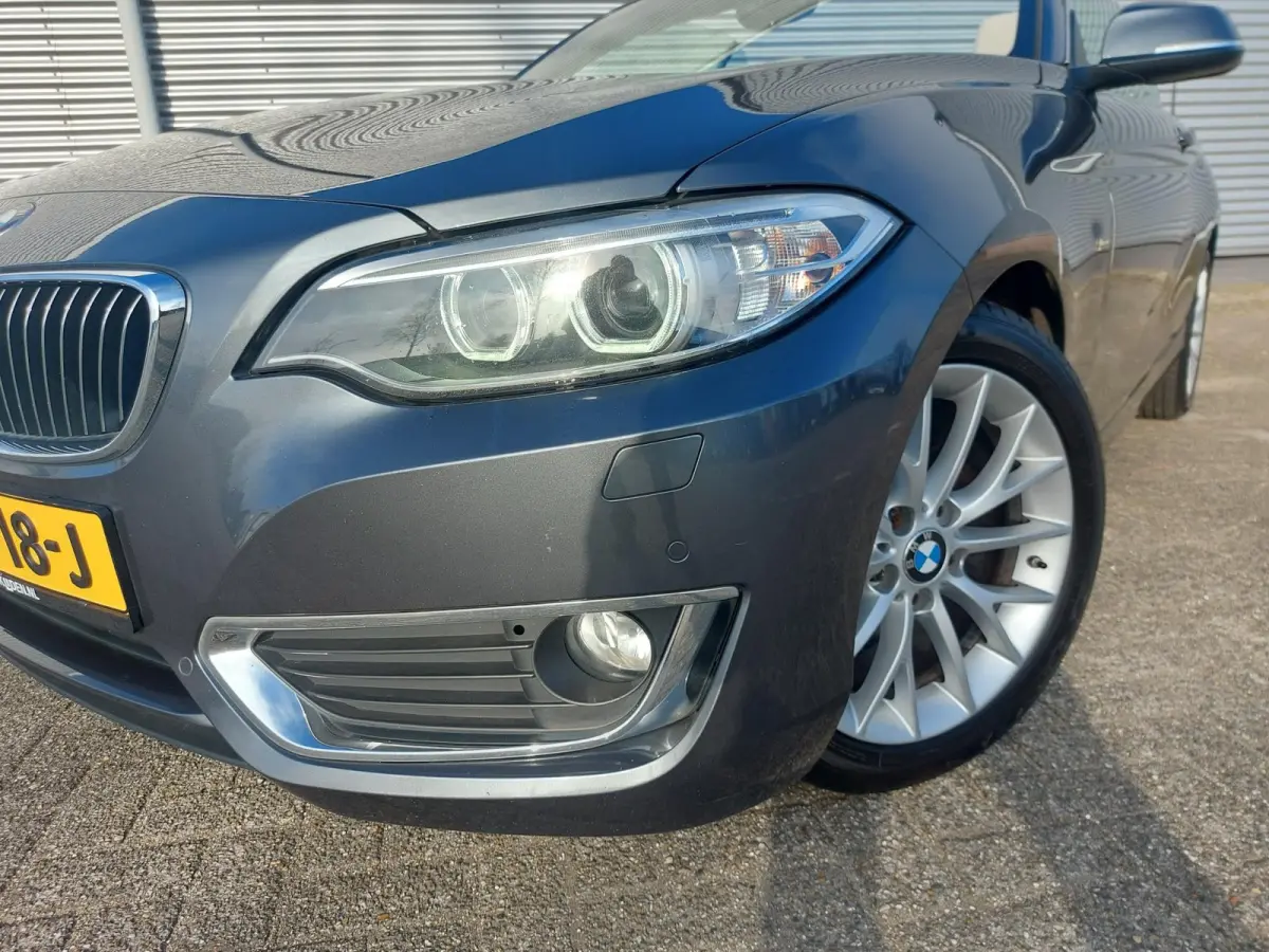 218i High Executive, airco,navigatie,stoelverwarming,parkeersensoren,cruisecontrol,