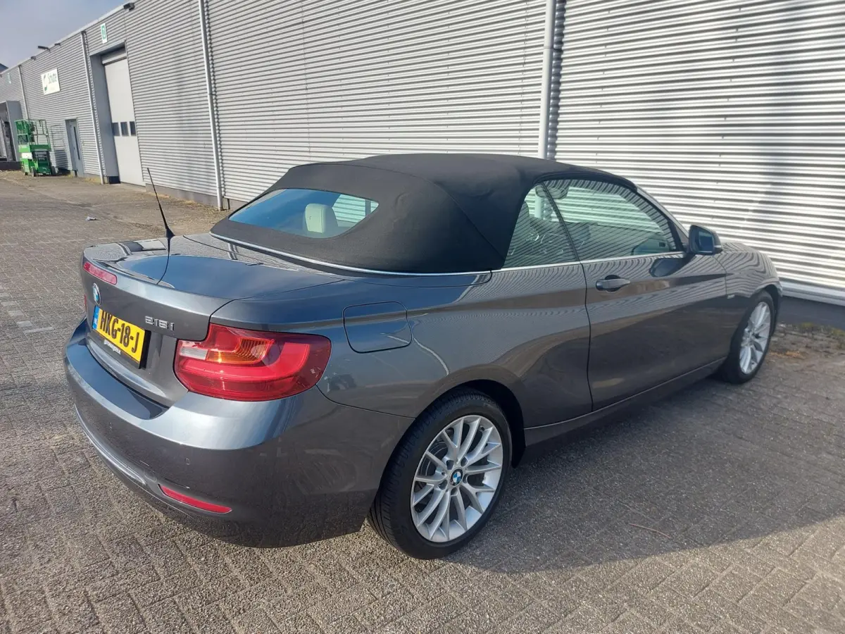 218i High Executive, airco,navigatie,stoelverwarming,parkeersensoren,cruisecontrol,