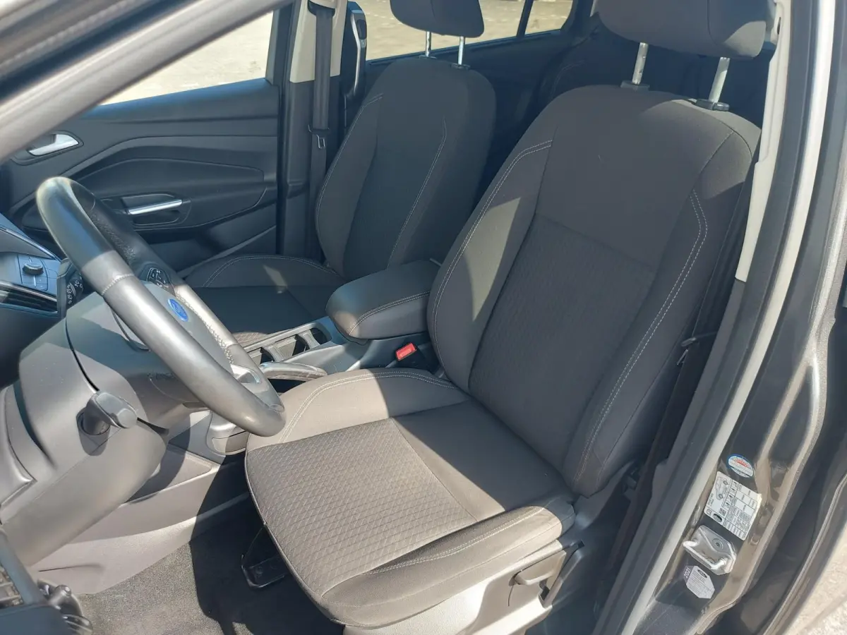 1.0 Titanium, airco,cruise,navigatie/camera,stoel/stuurverwarming,voorruit verwarmd,parkeersensoren,