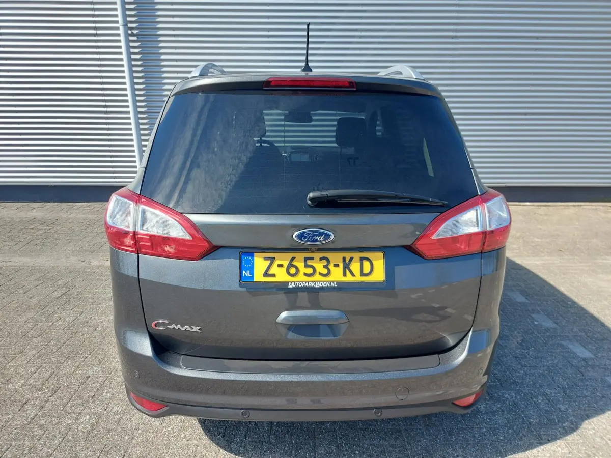1.0 Titanium, airco,cruise,navigatie/camera,stoel/stuurverwarming,voorruit verwarmd,parkeersensoren,