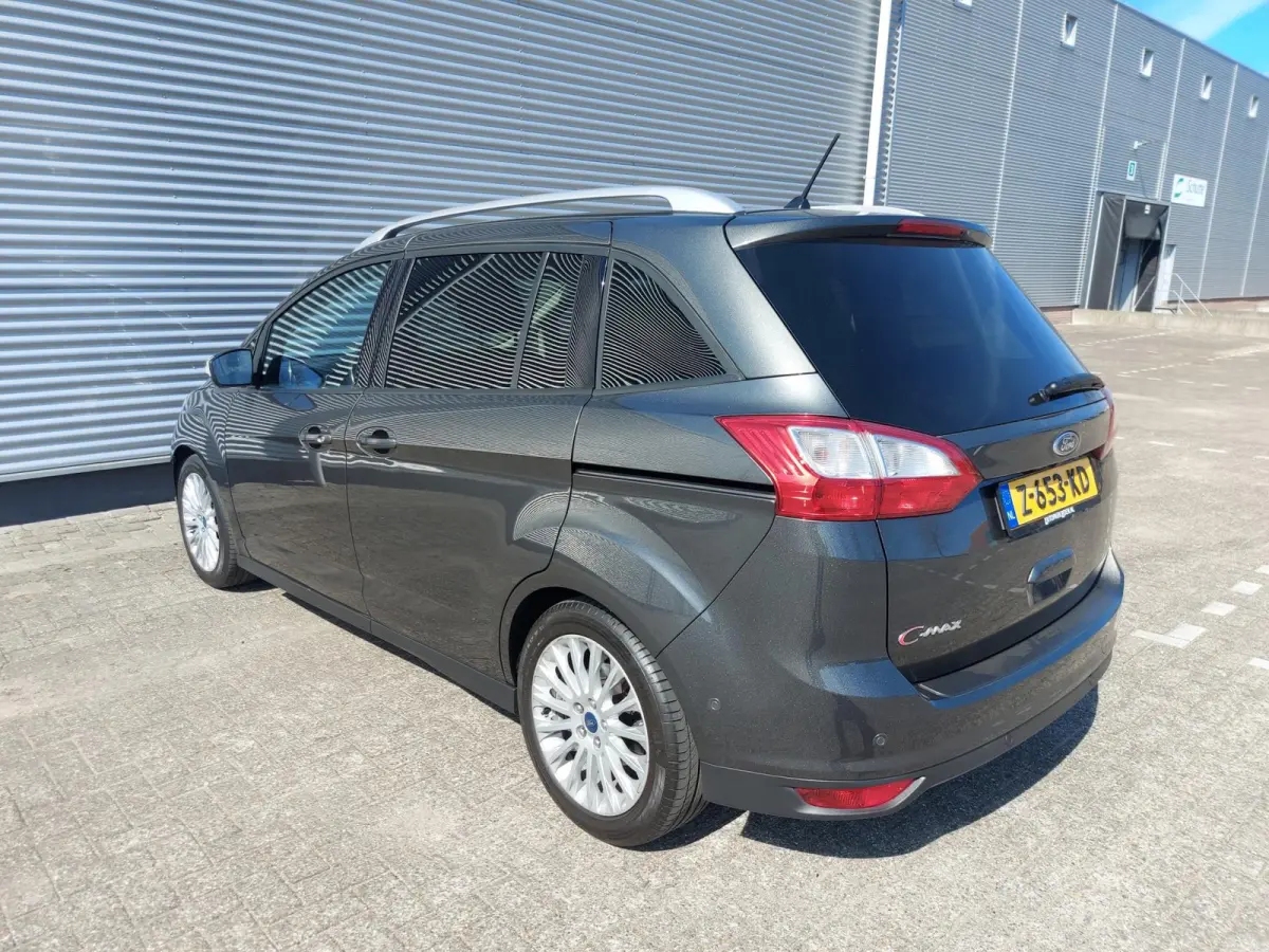 1.0 Titanium, airco,cruise,navigatie/camera,stoel/stuurverwarming,voorruit verwarmd,parkeersensoren,