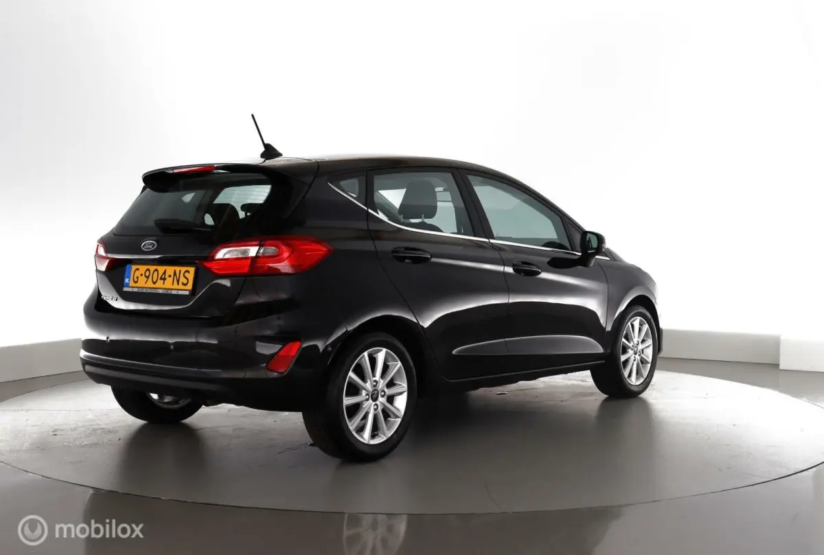 1.0 EcoB. 101pk Titanium NL-auto|nav|cam|ecc|lmv16