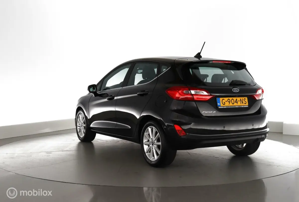 1.0 EcoB. 101pk Titanium NL-auto|nav|cam|ecc|lmv16