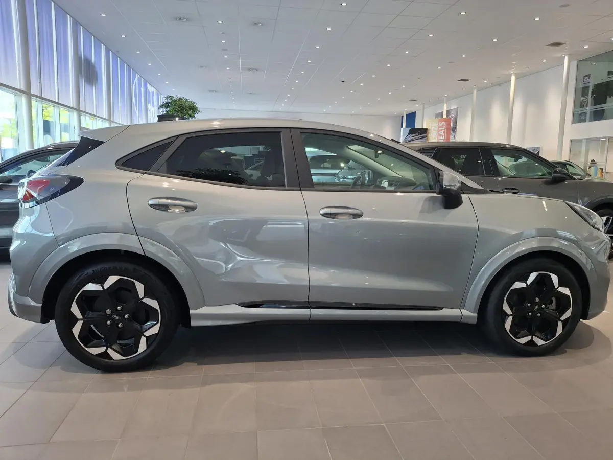 Premium 47 kWh | NIEUW TE BESTELLEN! | € 4400,- KORTING | AUTOMAAT | STOEL, STUUR EN VOORRUITVERWARMING | ADAPTIEVE CRUISE CONTROL | 360 CAMERA