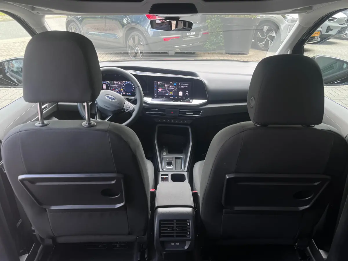 1.5 PHEV Titanium 7 Persoons | 100km Elektrisch Rijbereik | Camera | 1400kg Trekgewicht | 17 inch licht metaal | 7-persoons uitvoering | Achteruitrijcamera
