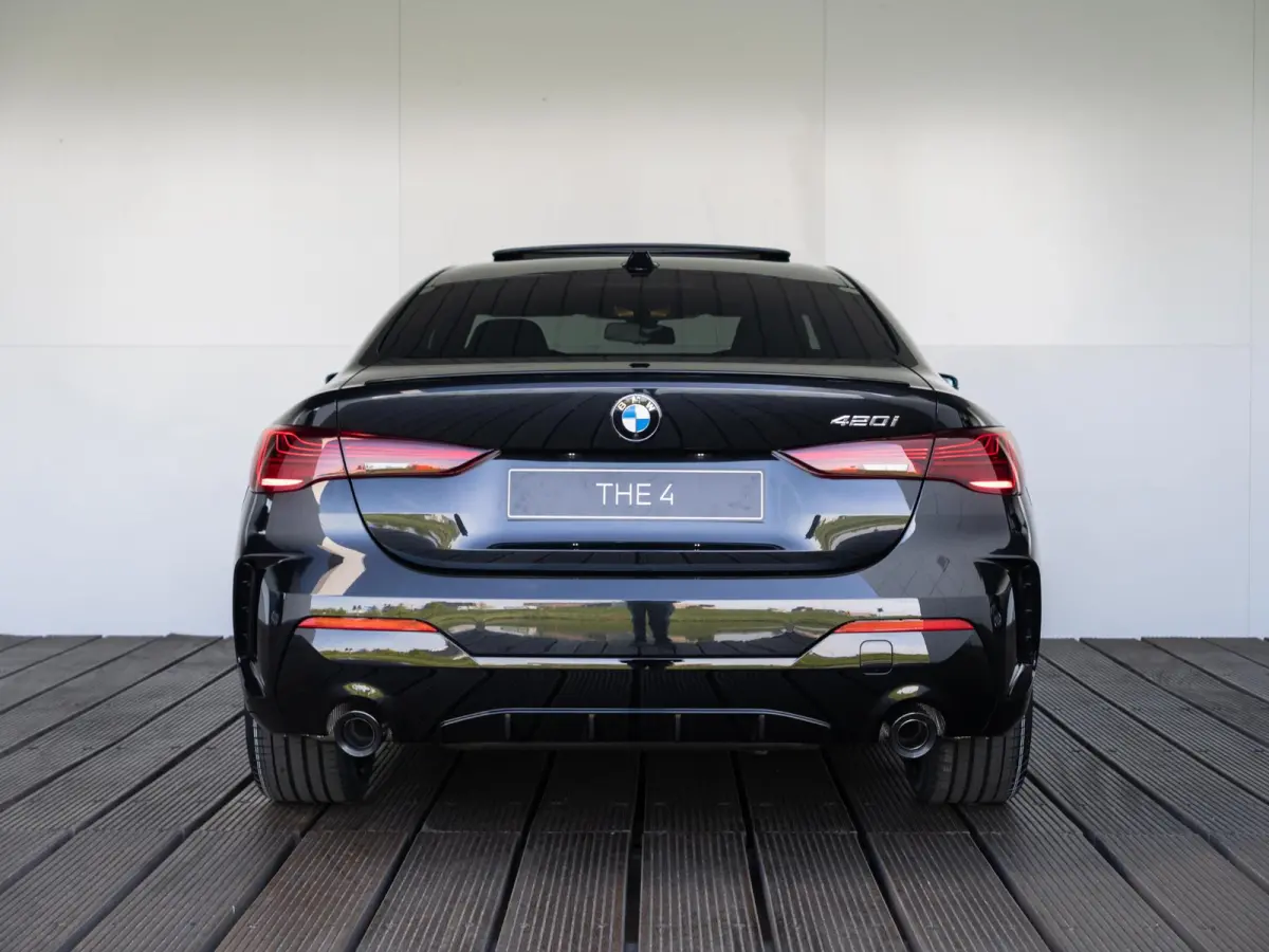 420i M Sport Pro | Schuif-/kanteldak | Harman Kardon | Stoel en Stuurwiel verwarming | Comfort Access | Elektrische achterklep
