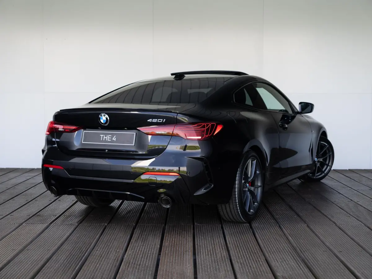 420i M Sport Pro | Schuif-/kanteldak | Harman Kardon | Stoel en Stuurwiel verwarming | Comfort Access | Elektrische achterklep