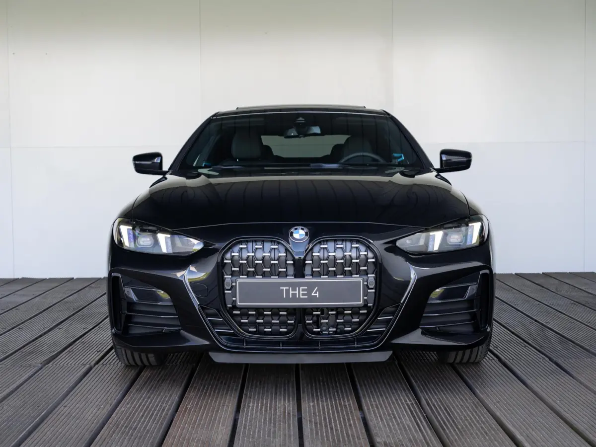420i M Sport Pro | Schuif-/kanteldak | Harman Kardon | Stoel en Stuurwiel verwarming | Comfort Access | Elektrische achterklep