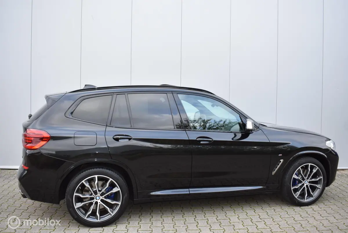 M40i xDrive Saphirschwarz Pano HUD H/K 360°Cam DAB Memory 20" LMV Zeer mooi!