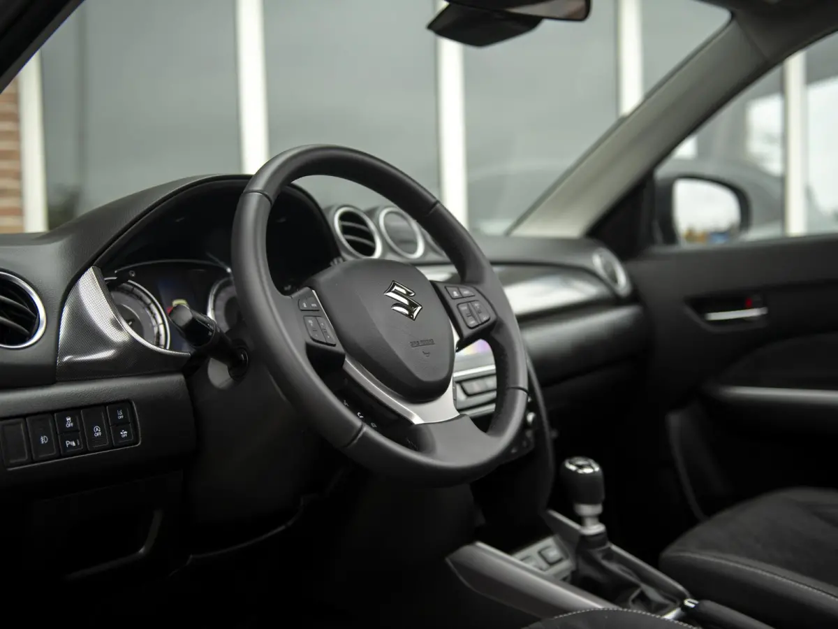 1.4 Boosterjet Style Smart Hybrid | Panoramadak | Navigatie | Apple Carplay/Android Auto | Stoelverwarming | Keyless | Adaptive Cruise Control