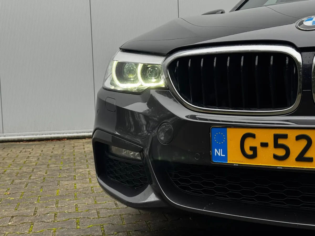 520i M-SPORT HIGH EXECUTIVE PANORAMADAK DEALER STOELVERWARMING LEDER M PAKKET VIRTUAL AMBIANCE TREKHAAK