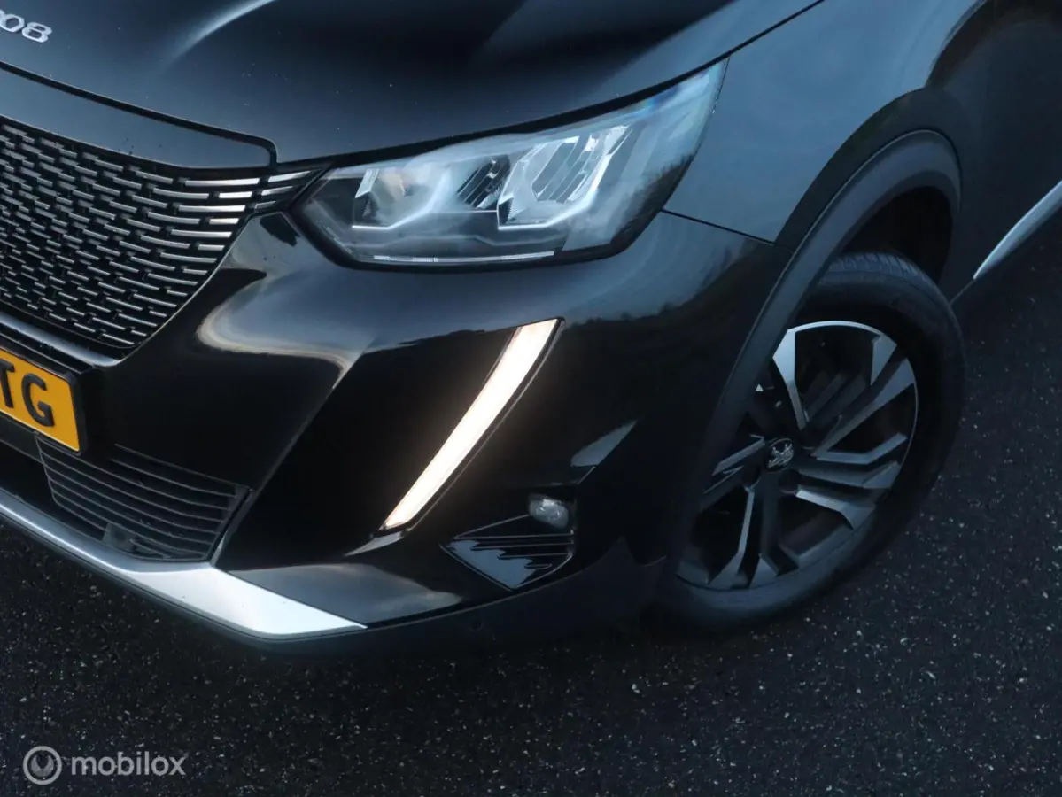 1.2 PT 131 PK H6 Allure Navi|Camera|3D Cockpit|LED|1/2Leer|Carplay|DonkerGlas