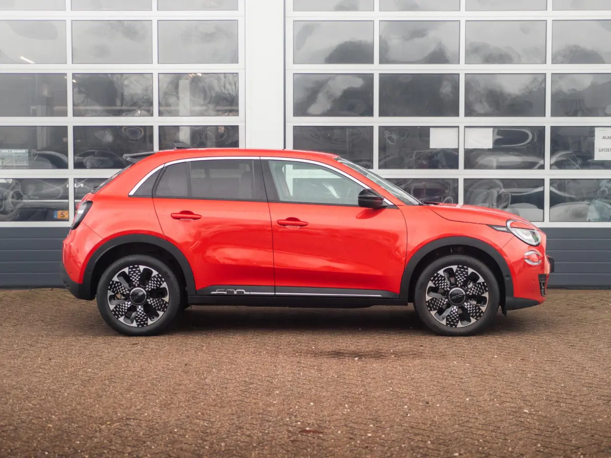 La Prima 54 kWh | 17% Bijtelling | Carplay | Elek. Stoel | Stoelverwarming | Keyless | LED | Clima