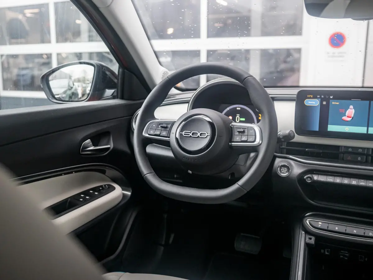 La Prima 54 kWh | 17% Bijtelling | Carplay | Elek. Stoel | Stoelverwarming | Keyless | LED | Clima