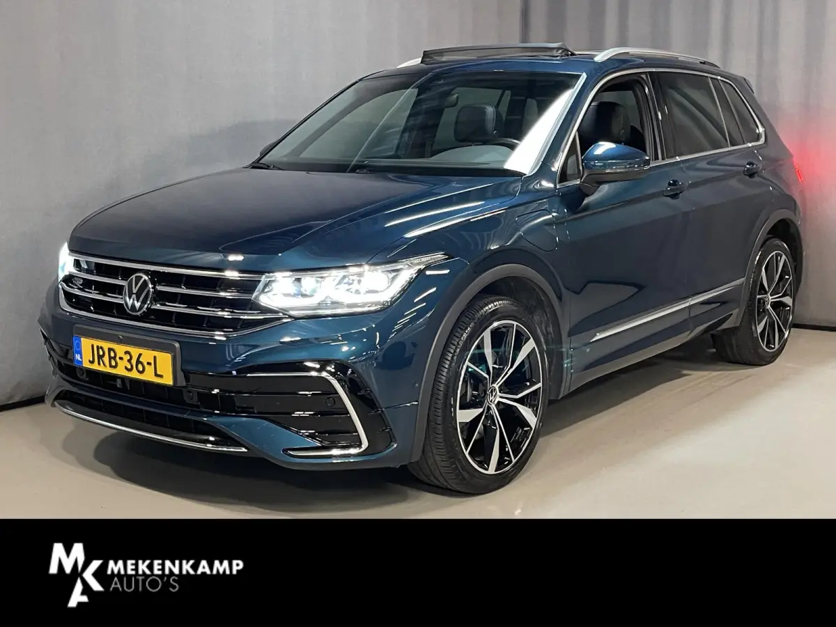 1.4 TSI eHybrid R-Line Business+ FABRIEKSGARANTIE TOT 03-2027 20"/VOL Leder + memory/Panoramadak/360 camera/Elektrische klep/Dodehoek/Stuur + stoelverwarming/IQ Lights/Adaptieve cruise