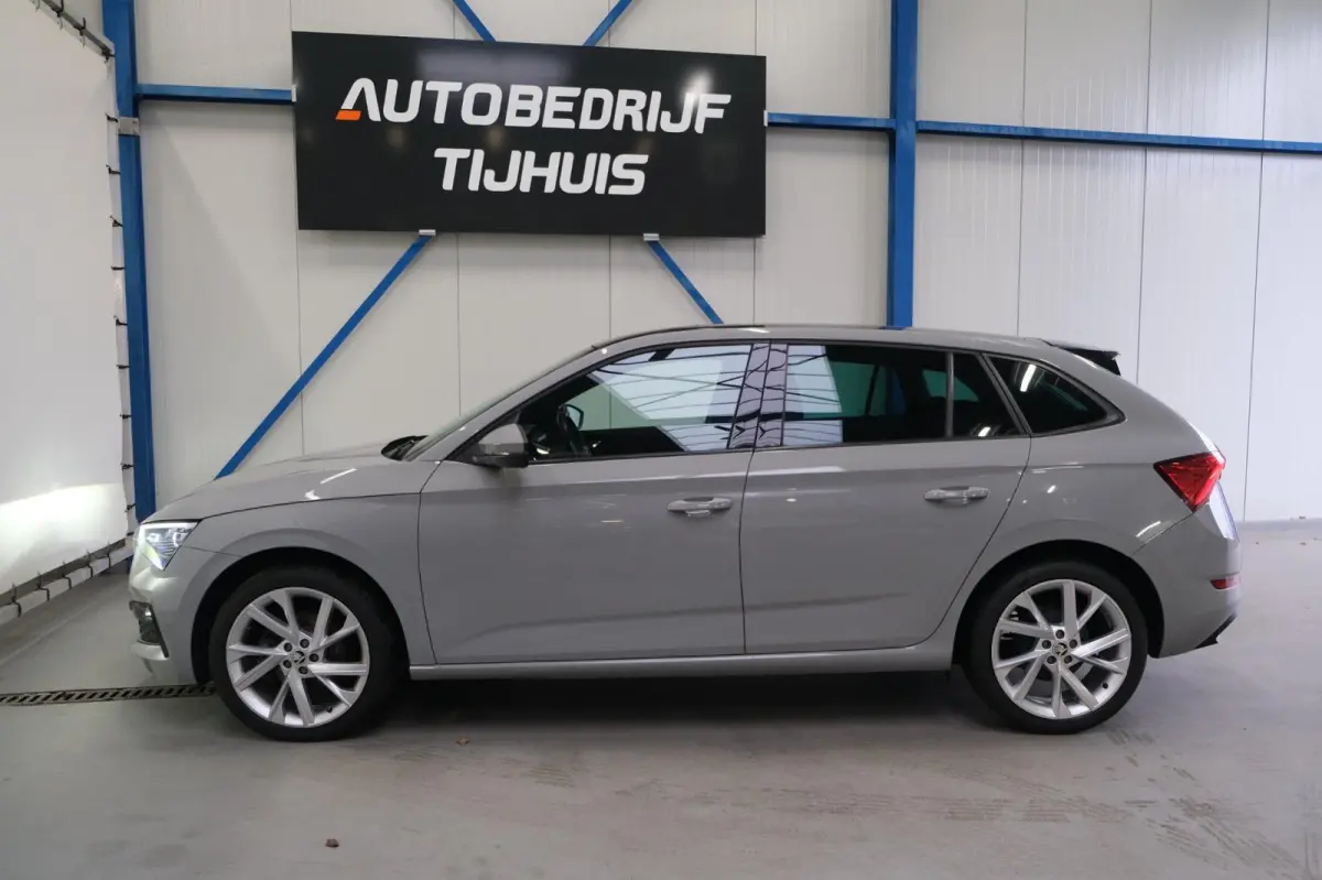 1.0 TSI Sport Business Automaat - N.A.P. Airco, Cruise, Navi, PDC, Stoelverwarming, Panodak.