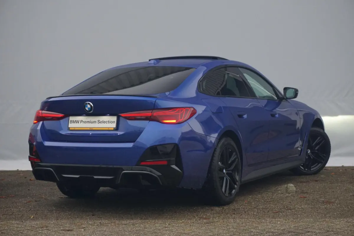 Gran Coupé eDrive40 M Sportpakket Pro | Schuif-/kanteldak | Active Cruise Control | Verwarmde stoelen voor en achter | Comfort Access |