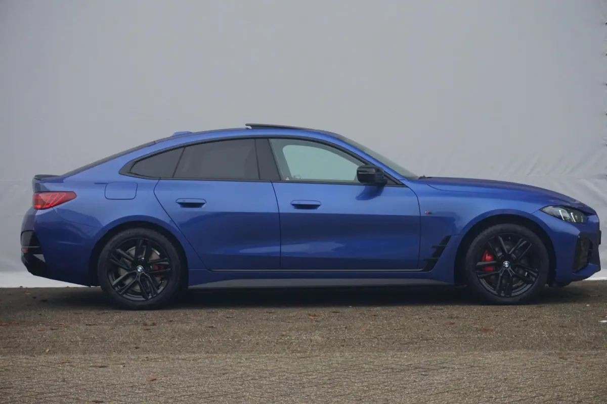 Gran Coupé eDrive40 M Sportpakket Pro | Schuif-/kanteldak | Active Cruise Control | Verwarmde stoelen voor en achter | Comfort Access |