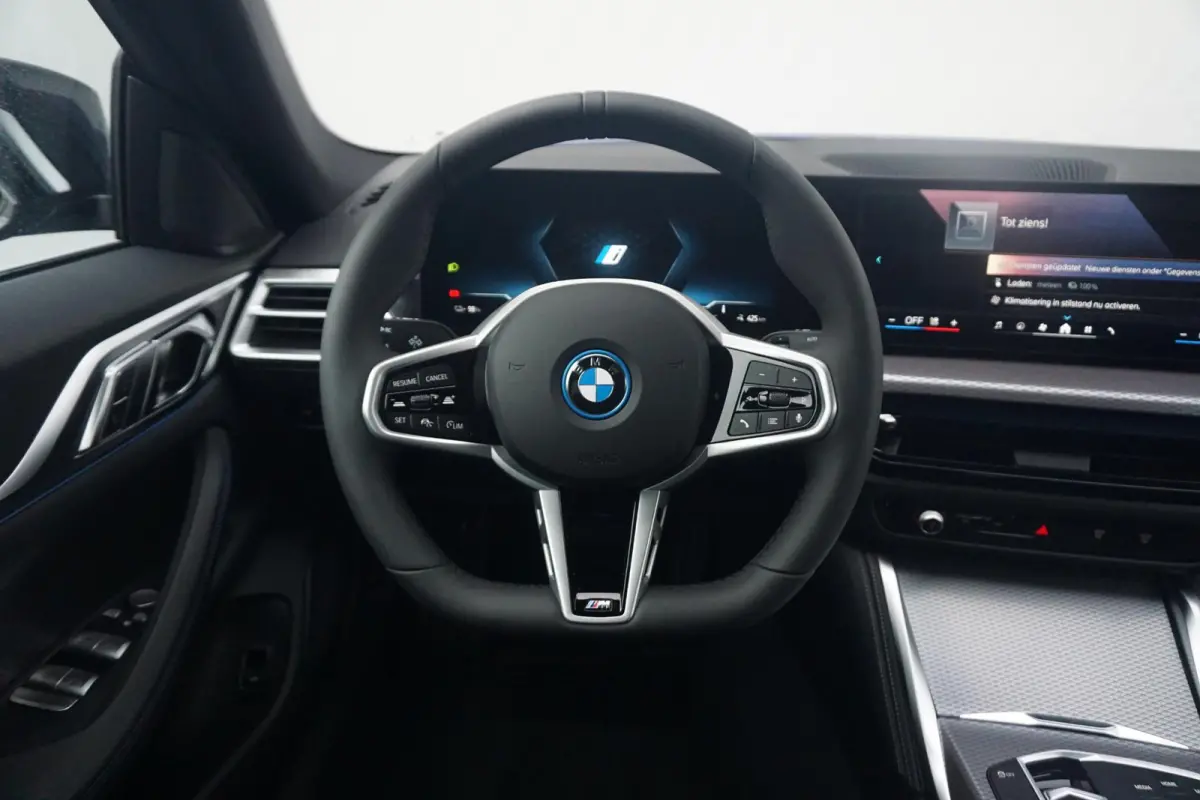 Gran Coupé eDrive40 M Sportpakket Pro | Schuif-/kanteldak | Active Cruise Control | Verwarmde stoelen voor en achter | Comfort Access |