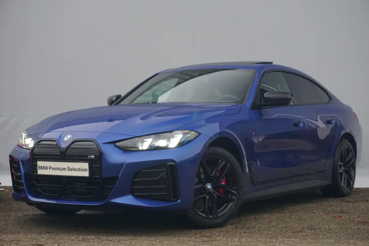 Gran Coupé eDrive40 M Sportpakket Pro | Schuif-/kanteldak | Active Cruise Control | Verwarmde stoelen voor en achter | Comfort Access |
