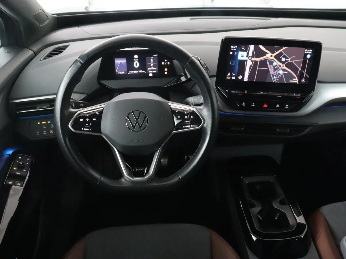 ID.4 First 77 kWh | Stoel & stuurverwarming | Camera | Carplay | Adaptive cruise | Half leder | 20'' | Navigatie | DAB | Sfeerverlichting