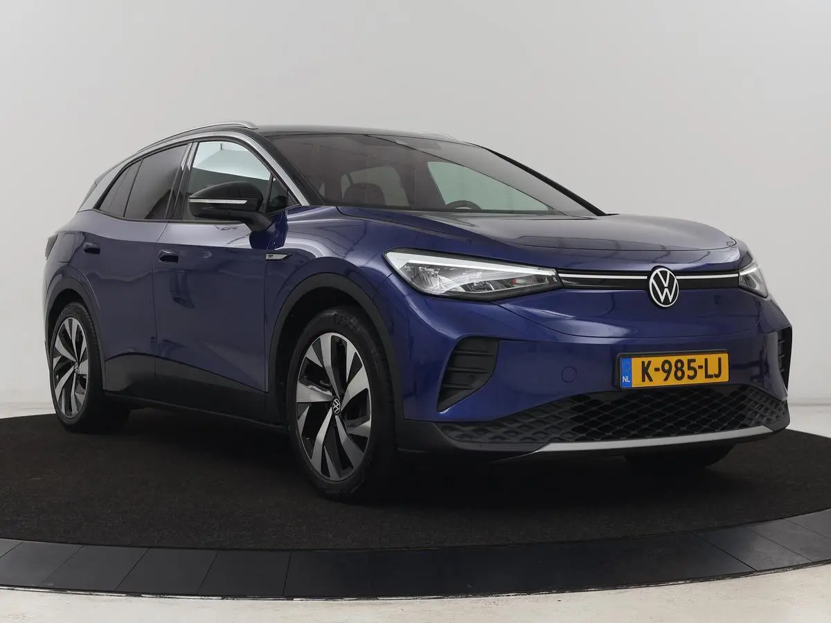 ID.4 First 77 kWh | Stoel & stuurverwarming | Camera | Carplay | Adaptive cruise | Half leder | 20'' | Navigatie | DAB | Sfeerverlichting