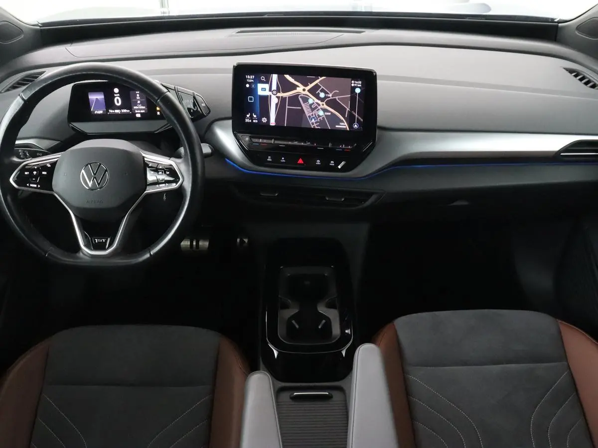 ID.4 First 77 kWh | Stoel & stuurverwarming | Camera | Carplay | Adaptive cruise | Half leder | 20'' | Navigatie | DAB | Sfeerverlichting