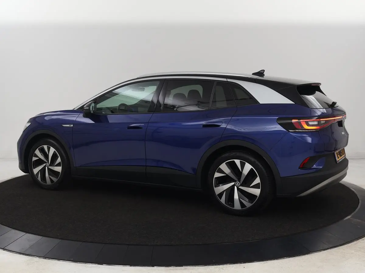 ID.4 First 77 kWh | Stoel & stuurverwarming | Camera | Carplay | Adaptive cruise | Half leder | 20'' | Navigatie | DAB | Sfeerverlichting