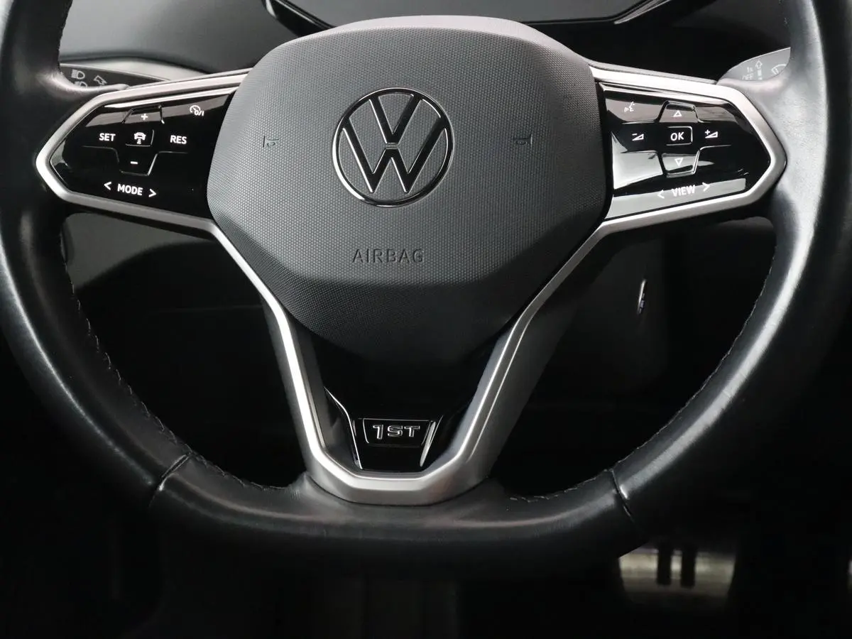 ID.4 First 77 kWh | Stoel & stuurverwarming | Camera | Carplay | Adaptive cruise | Half leder | 20'' | Navigatie | DAB | Sfeerverlichting