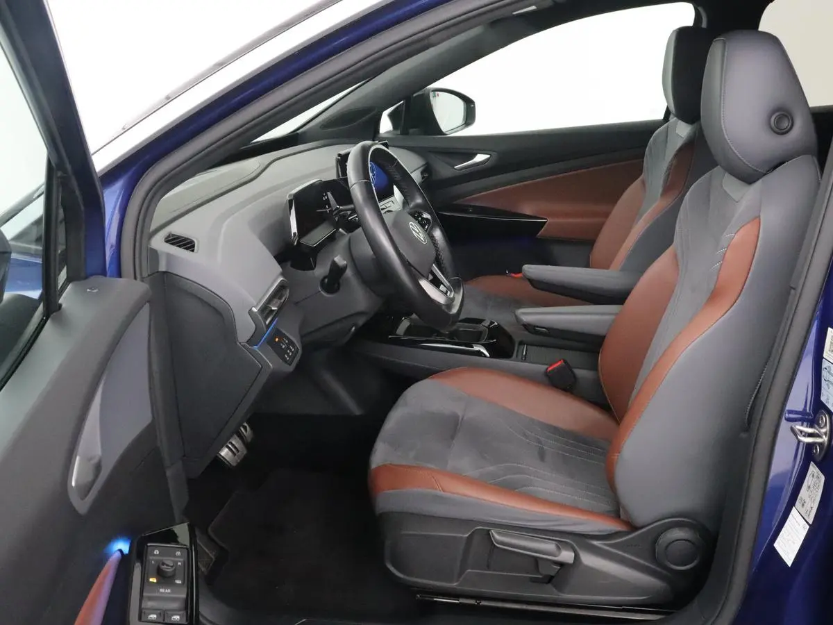 ID.4 First 77 kWh | Stoel & stuurverwarming | Camera | Carplay | Adaptive cruise | Half leder | 20'' | Navigatie | DAB | Sfeerverlichting