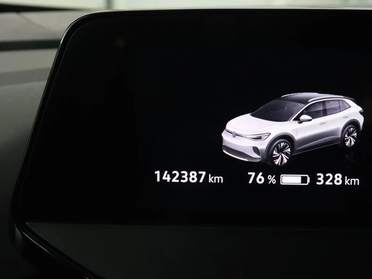 ID.4 First 77 kWh | Stoel & stuurverwarming | Camera | Carplay | Adaptive cruise | Half leder | 20'' | Navigatie | DAB | Sfeerverlichting