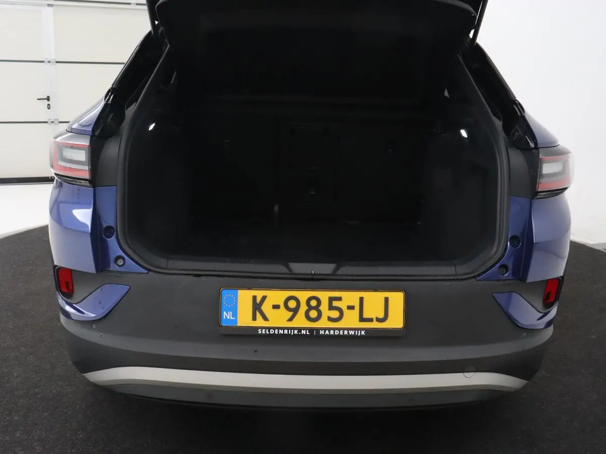 ID.4 First 77 kWh | Stoel & stuurverwarming | Camera | Carplay | Adaptive cruise | Half leder | 20'' | Navigatie | DAB | Sfeerverlichting