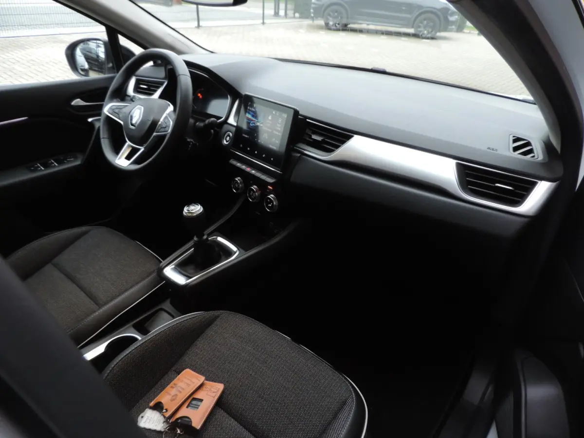 1.0 TCe 90 Intens 66.000km | LED kopl | PDC | Halfleer | Navi | CarPlay | ECC | 17” | Keyless | Priv.glas | DAB