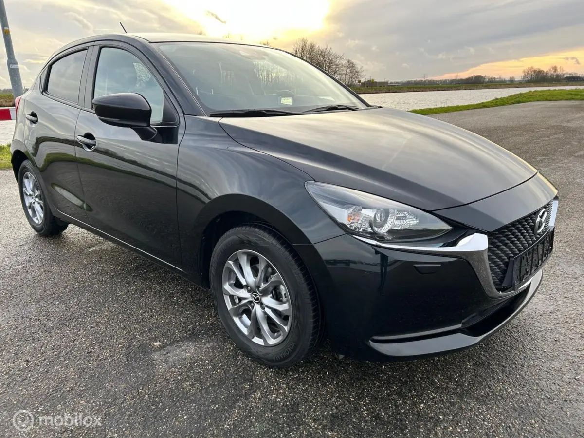 1.5 e-SkyActiv-G 90 Exclusive-Line