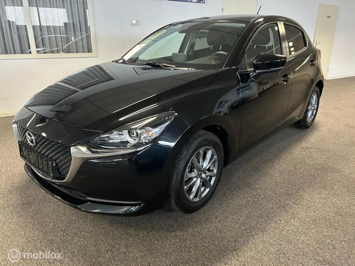1.5 e-SkyActiv-G 90 Exclusive-Line