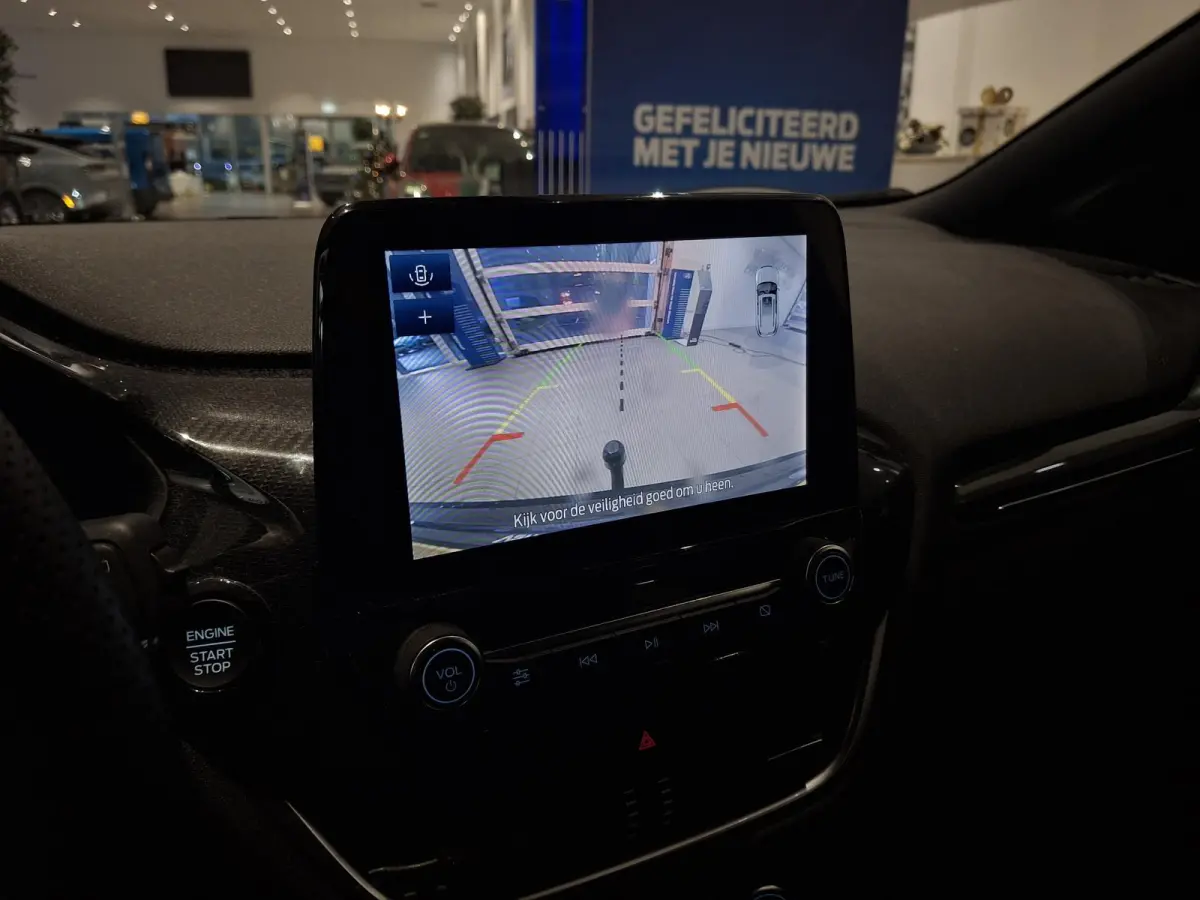 1.0 EcoBoost ST-Line | ADAPTIEVE CRUISE CONTROL | STOEL, STUUR EN VOORRUITVERWARMING | AFNEEMBARE TREKHAAK | APPLE CARPLAY / ANDROID AUTO | CAMERA |