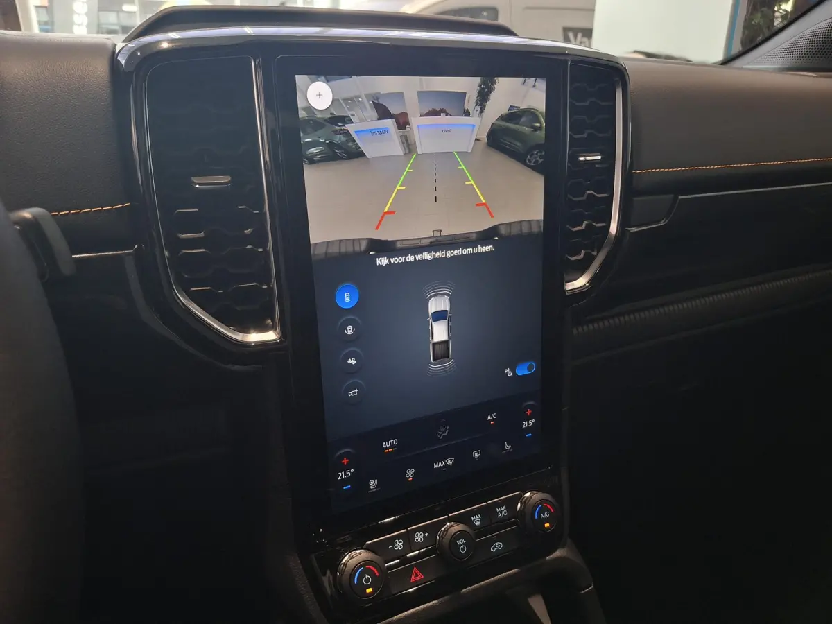 Wildtrak PHEV | DUBBELE CABINE | TREKHAAK | 18 INCH VELGEN | NAVIGATIE | STOEL- EN STUURVERWARMING | PARKEERSENSOREN VÓÓR | ALARM MET BEWEGINGSSENSOREN | ADAPTIEVE CRUISE CONTROL | POWER R