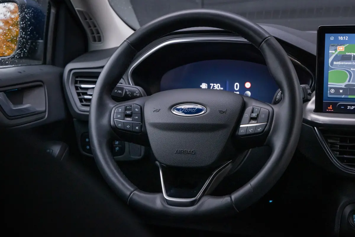 1.0 E.B. 155PK Hybrid Titanium X | AUOMAAT | Camera | Adaptieve cruise | AGR-stoel | Dodehoek detectie | Standkachel | LED | Keyless | DAB | Privacy-glass