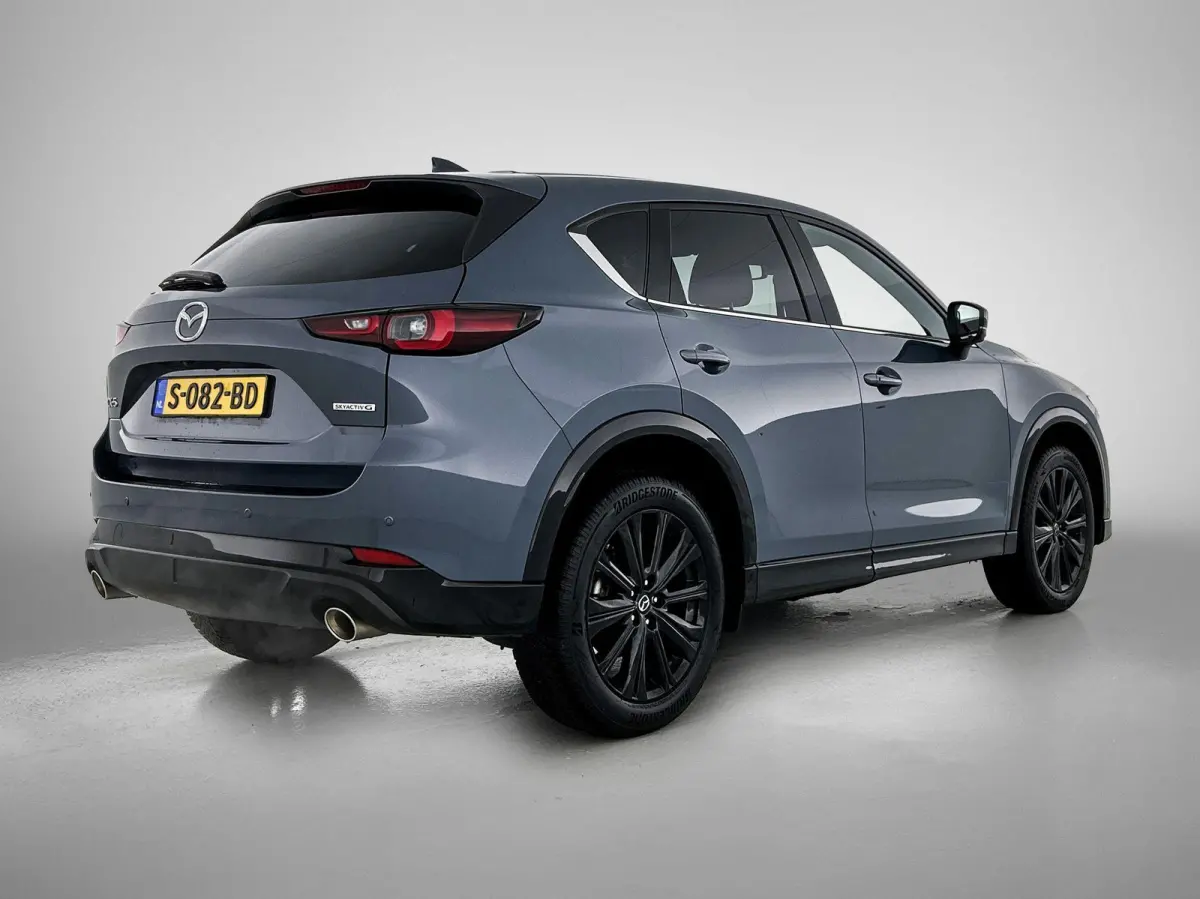 2.0 SkyActiv-G 165 Homura Limited | HEAD-UP | NAVIGATIE | CAMERA | STOEL-STUURWIELVERWARMING | DRAADLOZE TELEFOONLADER