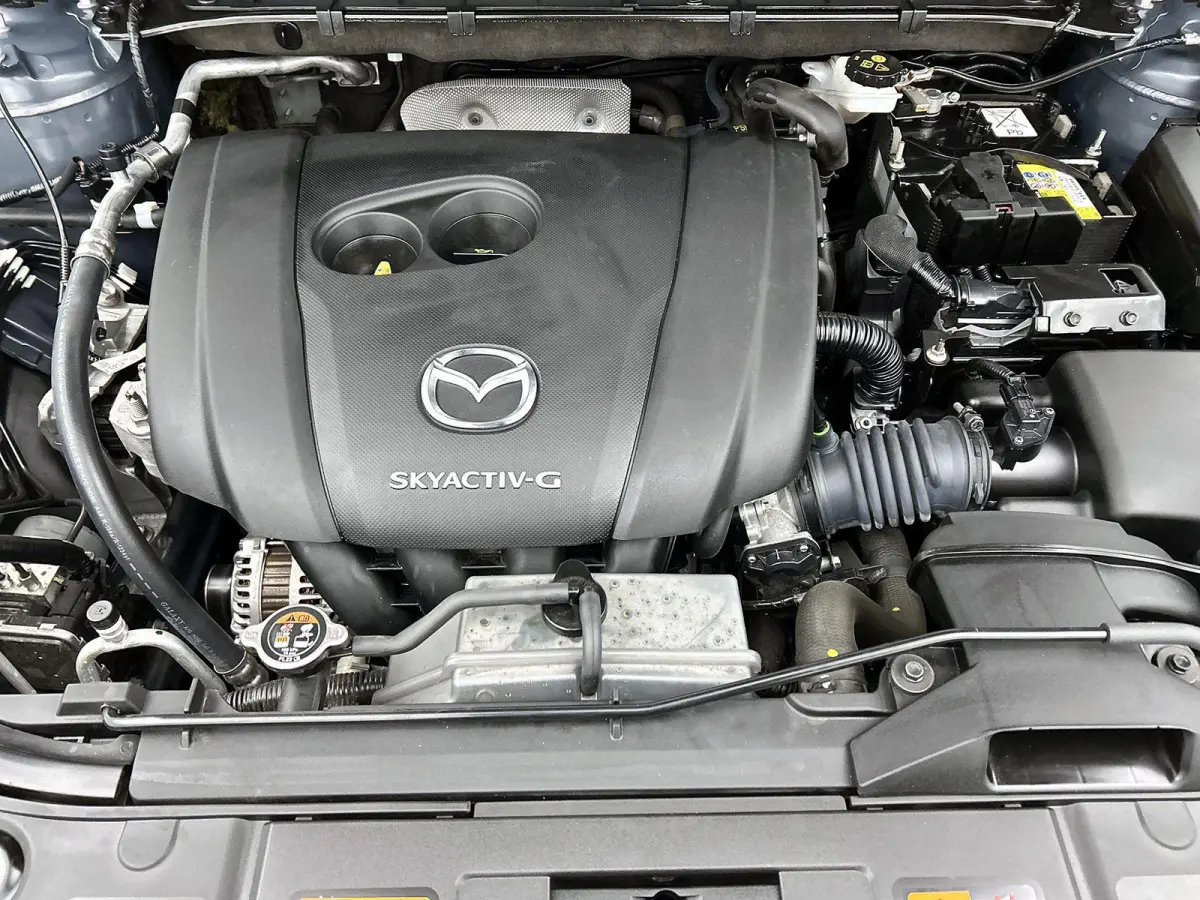 2.0 SkyActiv-G 165 Homura Limited | HEAD-UP | NAVIGATIE | CAMERA | STOEL-STUURWIELVERWARMING | DRAADLOZE TELEFOONLADER