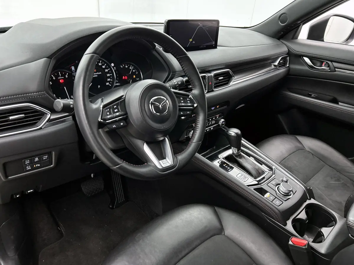 2.0 SkyActiv-G 165 Homura Limited | HEAD-UP | NAVIGATIE | CAMERA | STOEL-STUURWIELVERWARMING | DRAADLOZE TELEFOONLADER