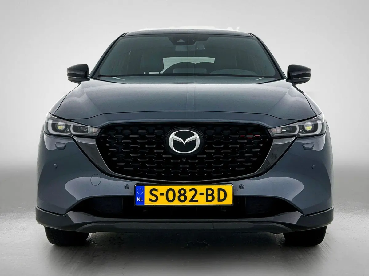 2.0 SkyActiv-G 165 Homura Limited | HEAD-UP | NAVIGATIE | CAMERA | STOEL-STUURWIELVERWARMING | DRAADLOZE TELEFOONLADER