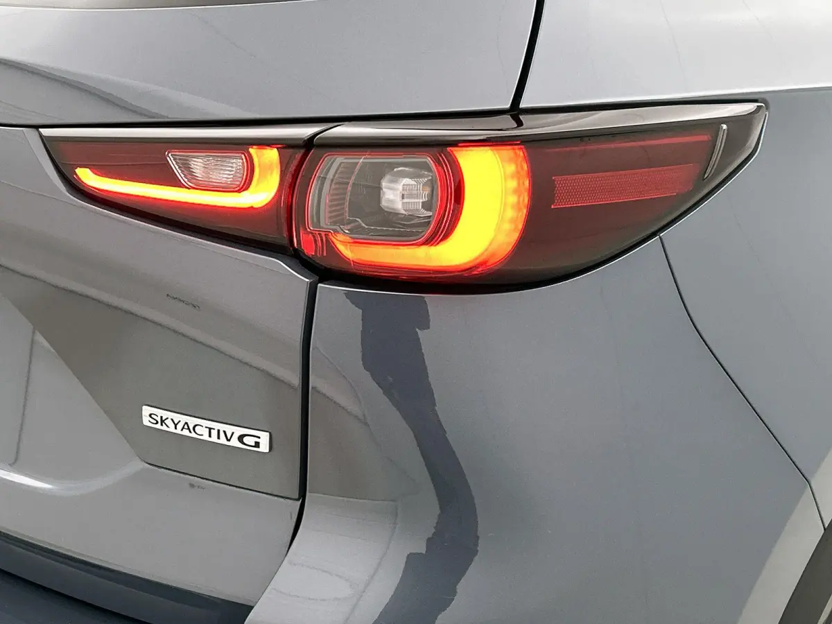 2.0 SkyActiv-G 165 Homura Limited | HEAD-UP | NAVIGATIE | CAMERA | STOEL-STUURWIELVERWARMING | DRAADLOZE TELEFOONLADER