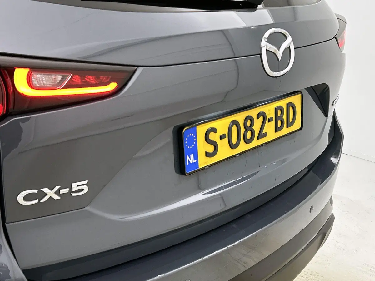 2.0 SkyActiv-G 165 Homura Limited | HEAD-UP | NAVIGATIE | CAMERA | STOEL-STUURWIELVERWARMING | DRAADLOZE TELEFOONLADER
